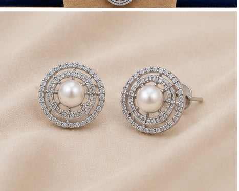 Round white freshwater cultured pearl earrings with rhodium finish