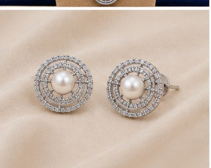 Round white freshwater cultured pearl earrings with rhodium finish